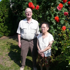 Peter and Hanh in their backyard garden in 2010
