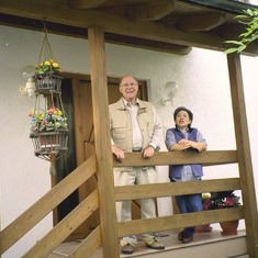 Peter and Hanh on their porch in 2001
