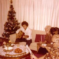 Decenber 24, 1977 - Peter and Yvonne's last Christmas together.  Singing carols with Peter accompanying on the guitar.  Taken in our home in Venice, CA. To the right of Peter is his mother, visiting from Slovakia, and then Yvonne's mother and stepfather.