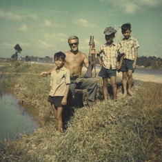 Peter fishing with the kids - Nam days