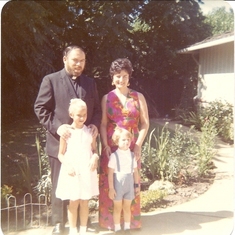 Priest Pete and young family