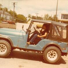 Phil in his jeep back in the day