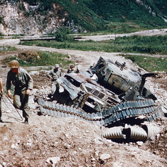 1953 - The trail had been mined by the enemy overnight.  Dad's tank was destroyed, with him standing halfway out of it doing reconnaissance at the time.  This was in June.