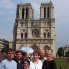 2003 - First day in France - The Gang At Notre Dame.  From left to right - Paul, Bruce, Diane, Cathryn, Dad and Mom