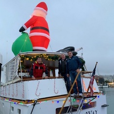Jon, Chris and Phil decorating the Easy Way 'in the rain' for another lighted boat parade at the StFYC. Always so much fun to cover a 56' boat with lights and decoration.