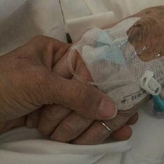 Holding my Mom's hand before she passed.