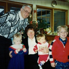 Polly and Bill and Grandkid: David, Amy, Tom, 