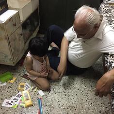 Grandfather and Grandson took all of Achamma's things to play, to her dismay