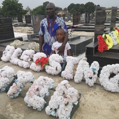 Josiah with uncle Tunde paid tribute