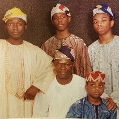 Daddy with the boys: Dokun, Deoye, Wole & Toks~ Christmas early 2000's