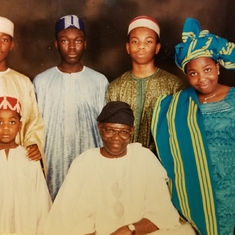 Daddy with all of us: Dokun, Deoye, Wole, Morin & Toks at Christmastime- early 2000s