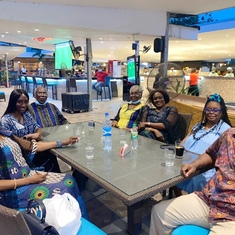 Grandpa out for lunch with his children and granddaughter in Lagos, April 2021