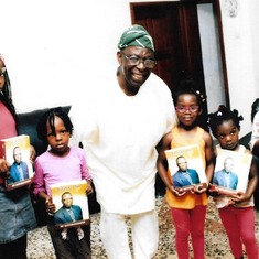 Presenting his grandchildren with his first autobiography