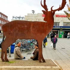 Enjoying the sculpture, "The Wimbledon Stag", by Isabelle Southwood