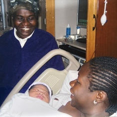 Mary looking at her new granddaughter Jordan, and Folake. Atlanta. 2007. 