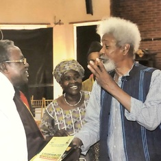 3 professors. The Kolawoles speaking with the Prof Wole Soyinka at an event.