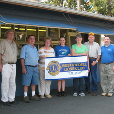 Working the blue food booth with the West Iredell Lions Club at the Iredell County Fairgrounds