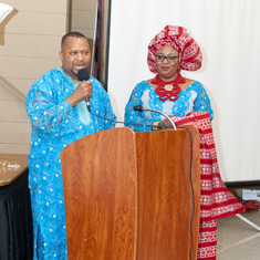 Mr Wilfred ALiu Otokiti delivering his tribute to his mother (Queen Mama Eniyemamwen Aliu-Otokiti), and beside him is his wife- Mrs Patience ALiu Otokiti