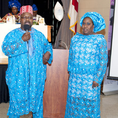 Dr Wilfred ALiu Otokiti (Son of Queen Mama Eniyemamwen Aliu-Otokiti) delivering his tribute for his mom. Standing beside him, his wife- Mrs. Ladashia ALiu Otokiti