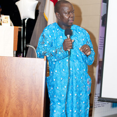 Pastor Rolland Ihaza rendering his tribute to Queen Mama Eniyemamwen Aliu-Otokiti