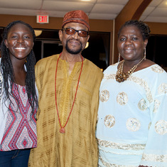 Elizabeth Onaodowan, with her daughter and father