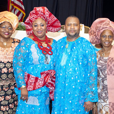 Mr and Mrs Wilfred ALiu Otokiti flanked by their guests