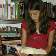 Rachel in her element surrounded by books.