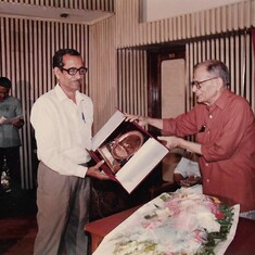 Receiving one of his multiple Awards 
