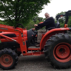 At home on his tractor!