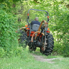 This is that last photo I took of Ramsey...he was taking the tractor back to the barn. 