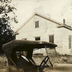 Quince Brotherton driving in front of the Mt. Horeb Presbyterian Church in the 1920s.