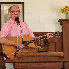 Frank Galbraith plays the guitar and sings at the 2018 Rankin Clan Reunion