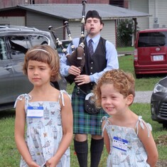 Bagpiper, Wyatt Brown with Lia and Mei FieldenCalle at the 2019 Rankin Clan Reunion