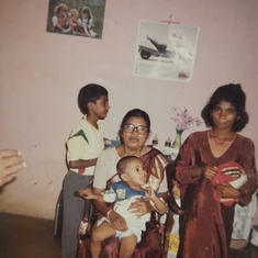 Mom with Anu in her lap. Pintu and pramila lookin on