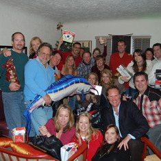 Many of Ray's peeps, Ray in the middle, at Tommy's famous white elephant party 2010