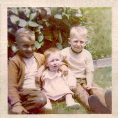 Brother Mike, infant Teresa and Ray