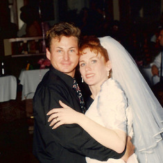 Teresa DeMayo and brother Ray at her wedding in 1992