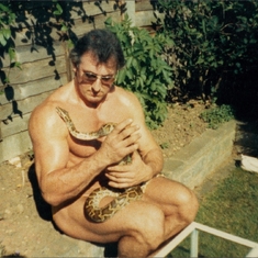 dad in 1988 sitting in the garden with monty the python