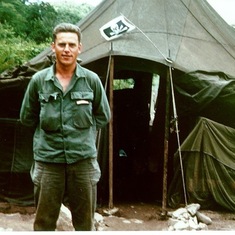 1952. Korean War.  Dad in front of his tent.
