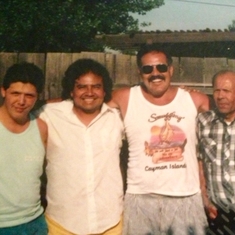 Ray, cousin Greg, Dad, Grandpa Sal at Uncle Roland's home in Pomona. 
