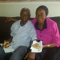 Enjoying Pizza together at grand daughter Ijeoma's house