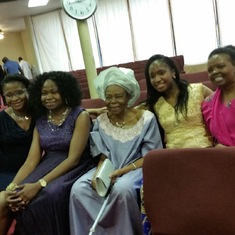 Mama with her lovely daughters and daughters in law enjoying church together