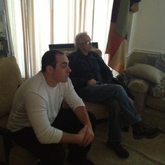 Jarrid and his grandpa watching something