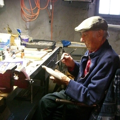 This is Dad in his basement workshop where he made wood carvings & paintings.  Some of his work can be seen on his daughter's website: colleenhammondart.com