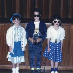 1987 - With friends Ellysha and Kimberley at the school concert. Rock and Roll theme.