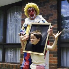 1986 December. Richard's birthday..he always was such a joker and loved performing. Here he is with Zodo the Clown.