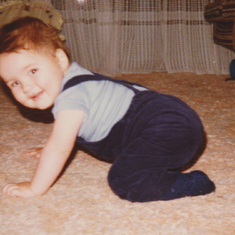 1981 - Starting to crawl at 9 months old.