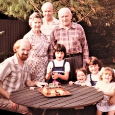 1982 Richard with his sisters, Michelle, Leanne (her 7th birthday) Andrea, Dad Martin, my Dad Pappa Paull and Great Grandparents Darl, (Emily) and Nung Nung (George)