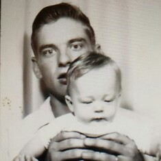 Dad holding Jeff, 1968.