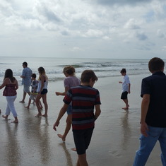 All family gathering at the ocean for Dad.